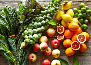 a group of fruits and vegetables on a wood surface Healthy Weight Loss Diets Cambridge
